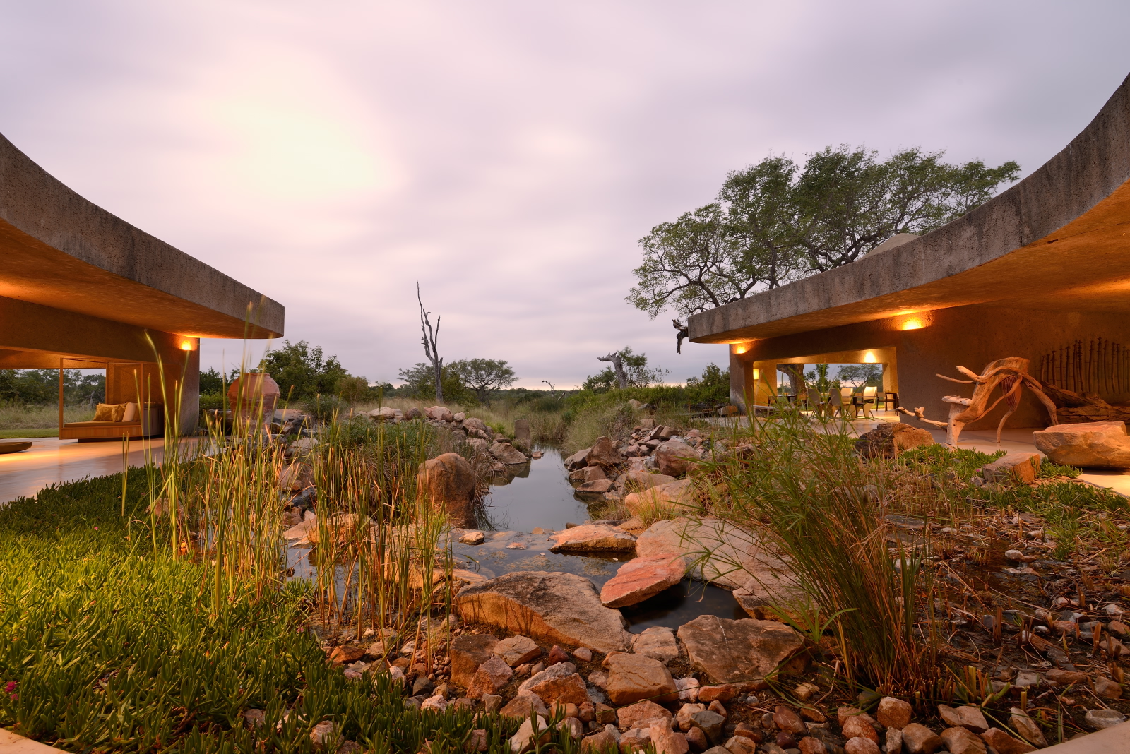<p>The Sabi Sabi Earth Lodge features a stunning water feature entrance, which is designed to create a sense of tranquility and harmony as guests arrive at the lodge.</p>